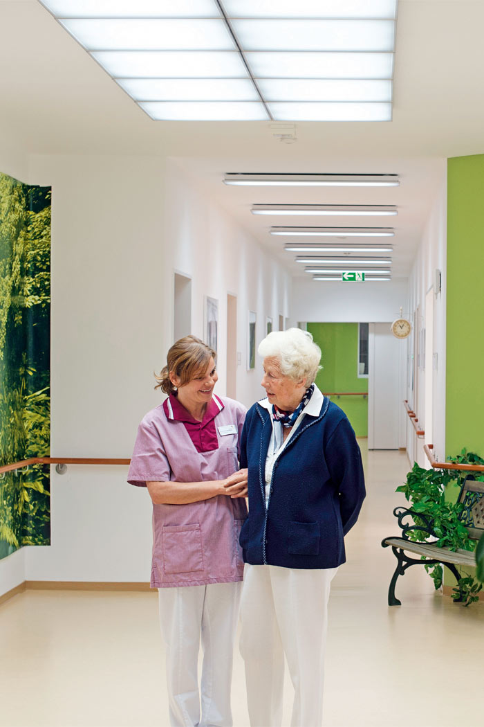 The corridor of Elderly Care Home illuminated by Philips Lighting
