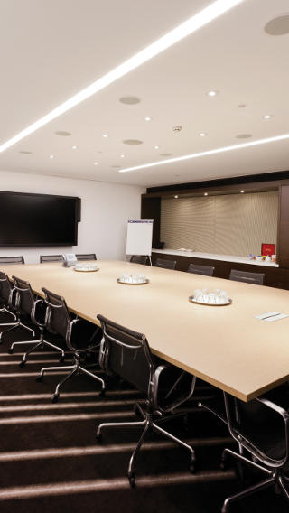 This meeting room at Westfield Sydney uses Philips office lighting controls to help save energy