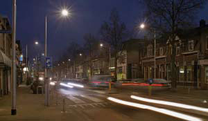 Busy street in a residential area lit by Philips
